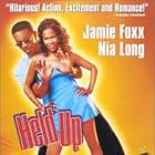 Nia Long and Jamie Foxx in Held Up (1999)