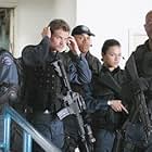 Samuel L. Jackson, LL Cool J, Colin Farrell, Michelle Rodriguez, and Brian Van Holt in S.W.A.T. (2003)