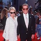 Roger Moore and Christina 'Kiki' Tholstrup at an event for The Quest (1996)