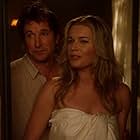 Noah Wyle and Rebecca Romijn in The Librarians (2014)