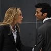 Piper Perabo and Sendhil Ramamurthy in Covert Affairs (2010)