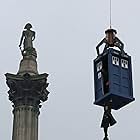 Matt Smith hangs from a suspended Tardis during filming of Dr Who, in Trafalgar Square on April 9, 2013 in London, England.