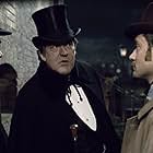 Jude Law, Robert Downey Jr., and Stephen Fry in Sherlock Holmes: A Game of Shadows (2011)