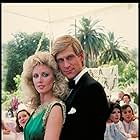 Morgan Fairchild and Simon MacCorkindale in Falcon Crest (1981)