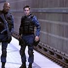 Samuel L. Jackson and Colin Farrell in S.W.A.T. (2003)