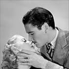 Errol Flynn and Anita Louise in Green Light (1937)