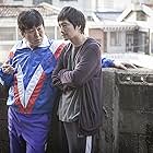 Park Hae-il and Yun Je-mun in Boomerang Family (2013)