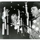 Eddie Constantine and Anna Karina in Alphaville, une étrange aventure de Lemmy Caution (1965)