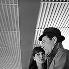 Eddie Constantine and Anna Karina in Alphaville, une étrange aventure de Lemmy Caution (1965)