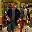 Edi Gathegi and Kyle Bornheimer in Family Tools (2013)