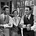 Gene Kelly, Debbie Reynolds, and Donald O'Connor in Singin' in the Rain (1952)