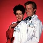 Sean Young and Michael McKean in Young Doctors in Love (1982)