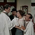 Daniel Ceccaldi, Georges Chamarat, Huguette Hue, and Robert Lamoureux in The Adventures of Arsène Lupin (1957)