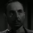 Douglass Dumbrille in Tell No Tales (1939)