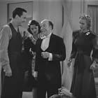 Yolande Donlan, John Hubbard, Carole Landis, and Donald Meek in Turnabout (1940)