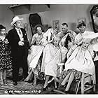 Moe Howard, Larry Fine, Dorothy Appleby, Dorothy DeHaven, Curly Howard, Marjorie Kane, Bob O'Connor, and Blanca Vischer in Cookoo Cavaliers (1940)