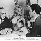 Brigitte Bardot, Jacques Mauclair, and Michel Roux in The Female (1958)