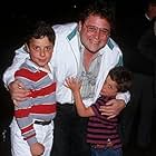 Still of Stephen Furst and sons Nathan Furst and Griff Furst attend the premiere of 'Rumpelstiltskin' on April 3, 1987 at the Academy Theater in Beverly Hills, CA