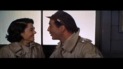 En route to Normandy, an American and a British officer reminisce in flashback about their romances with the same woman.