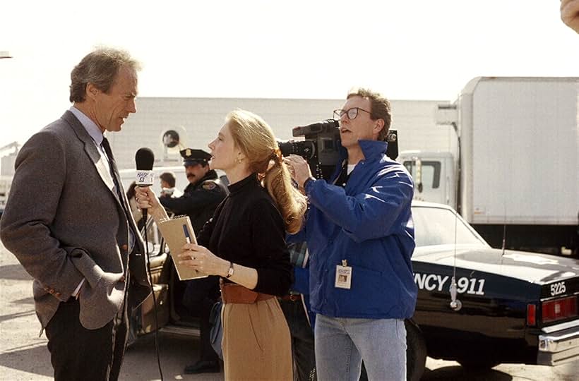 Clint Eastwood, Patricia Clarkson, and John X. Heart in The Dead Pool (1988)