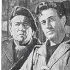 John McCallum and Victor McLaglen in Trouble in the Glen (1954)