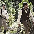 Jake Gyllenhaal and Riz Ahmed in The Sisters Brothers (2018)