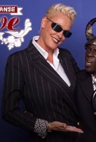 Brigitte Nielsen and Flavor Flav in Strange Love (2005)