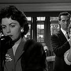 Rona Anderson, Robert Arden, and Faith Domergue in Spin a Dark Web (1956)