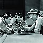 James Cagney, Robert Emmett O'Connor, and Edward Woods in The Public Enemy (1931)