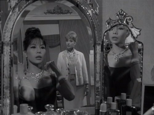 Jacqueline Chan and Sylvia Syms in The Saint (1962)