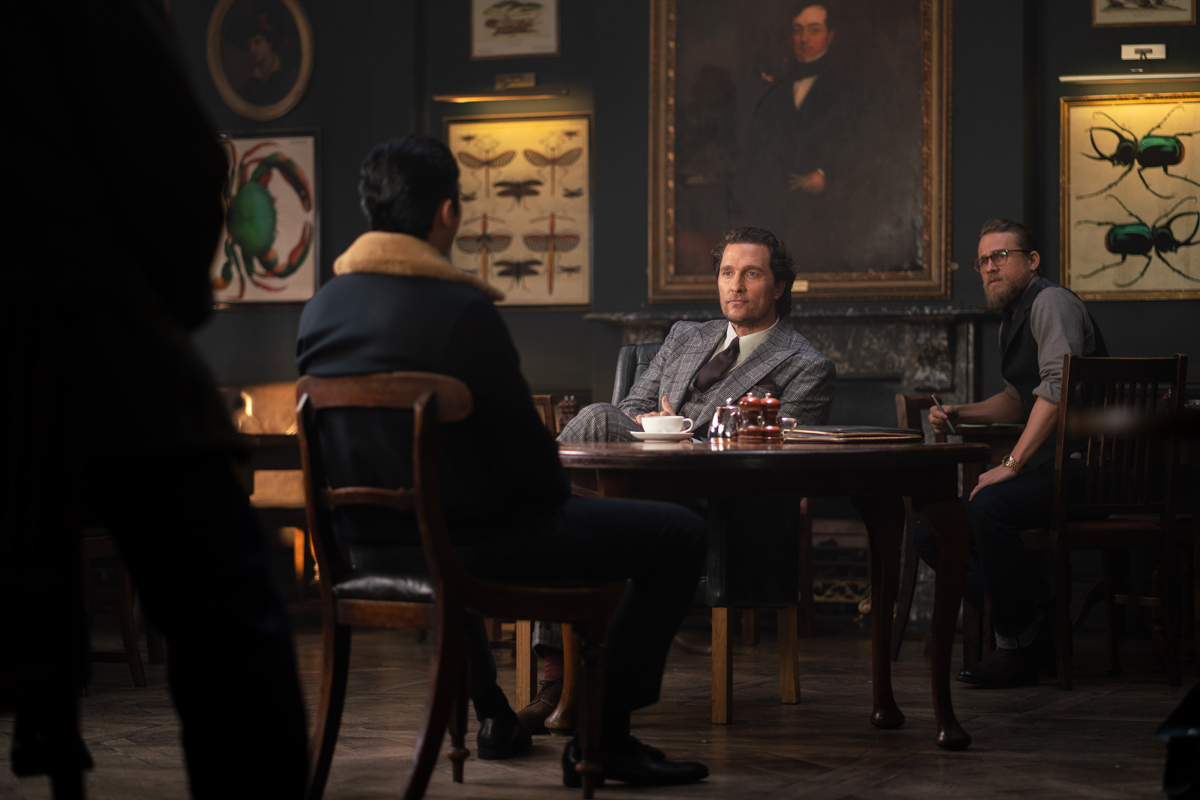 Matthew McConaughey, Charlie Hunnam, Jason Wong, and Henry Golding in The Gentlemen (2019)