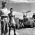 Charles Aznavour, Maurice Biraud, Germán Cobos, Hardy Krüger, and Lino Ventura in Taxi for Tobruk (1961)