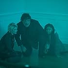 Russell Crowe, Chloe Bailey, and Ryan Simpkins in The Exorcism (2024)