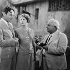 Frank Currier, William Haines, and Anita Page in Telling the World (1928)