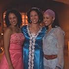 Tamera Mowry-Housley, Tia Mowry, and Kristen Wilson in Twitches (2005)