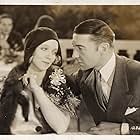 Clive Brook and Virginia Bruce in Slightly Scarlet (1930)