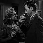 Virginia Mayo and Zachary Scott in Flaxy Martin (1949)