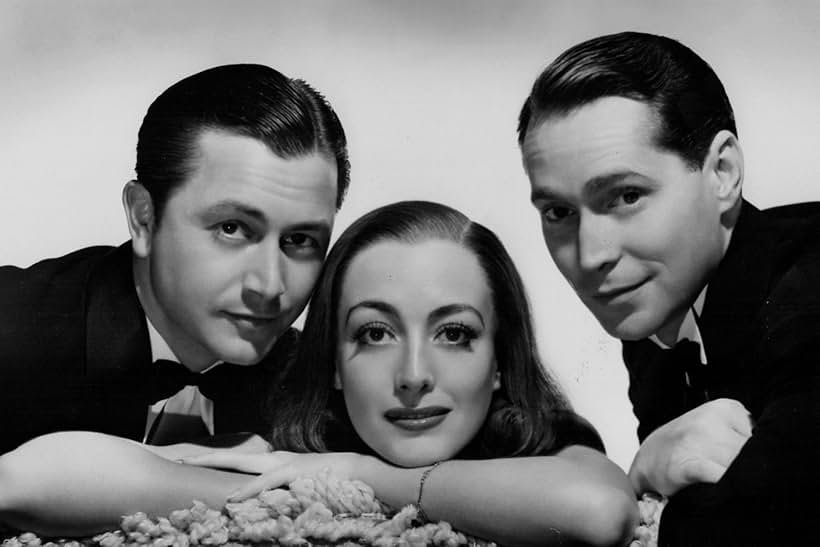 Joan Crawford, Robert Young, and Franchot Tone in The Bride Wore Red (1937)