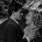 John Garfield and Priscilla Lane in Dust Be My Destiny (1939)