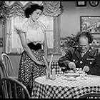 Larry Fine and Marie Monteil in Fifi Blows Her Top (1958)