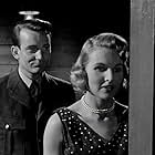 Denholm Elliott and Sheila Sim in The Night My Number Came Up (1955)