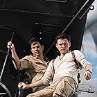 Mark Wahlberg and Tom Holland in Uncharted (2022)