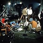 Paul McCartney, John Lennon, Neil Aspinall, Geoff Emerick, Mal Evans, George Harrison, Michael Lindsay-Hogg, Yoko Ono, Ringo Starr, and The Beatles in Let It Be (1970)