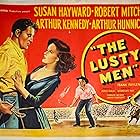 Robert Mitchum, Susan Hayward, and Arthur Kennedy in The Lusty Men (1952)