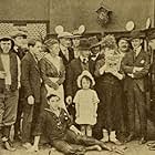 John G. Blystone, Eva McKenzie, Alice Howell, Ida Mae McKenzie, Robert McKenzie, and Fatty Voss in Neptune's Naughty Daughter (1917)