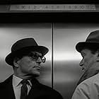 Eddie Constantine and Howard Vernon in Alphaville (1965)