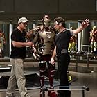 Robert Downey Jr., Shane Black, and Paul Bettany in Iron Man 3 (2013)