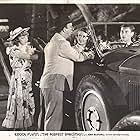 Joan Blondell, Errol Flynn, Allen Jenkins, and Dennie Moore in The Perfect Specimen (1937)