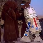 Tiffany Hillkurtz, Kenny Baker, and Jack Purvis in Star Wars: Episode IV - A New Hope (1977)