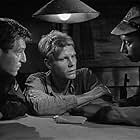 George Segal, James Fox, and Louis Neervort in King Rat (1965)